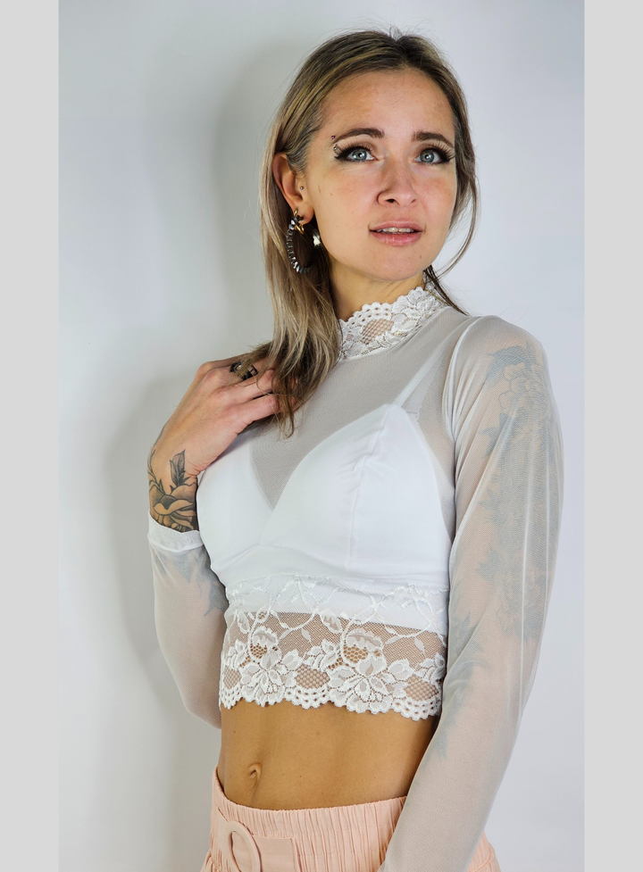 Long sleeve blouse with transparences