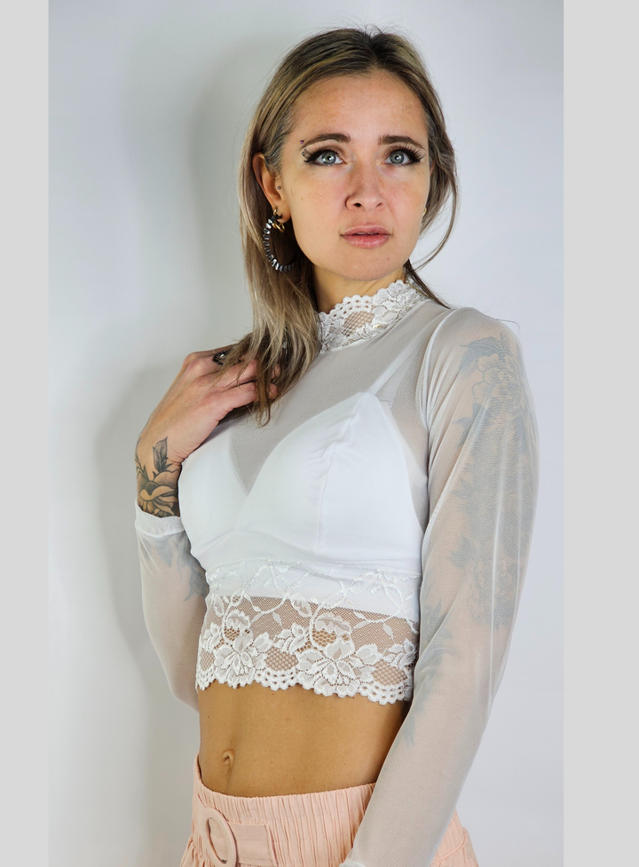 Long sleeve blouse with transparences