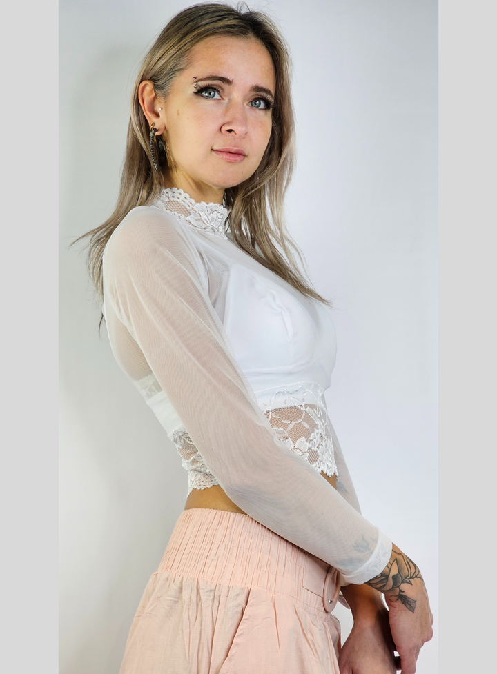 Long sleeve blouse with transparences