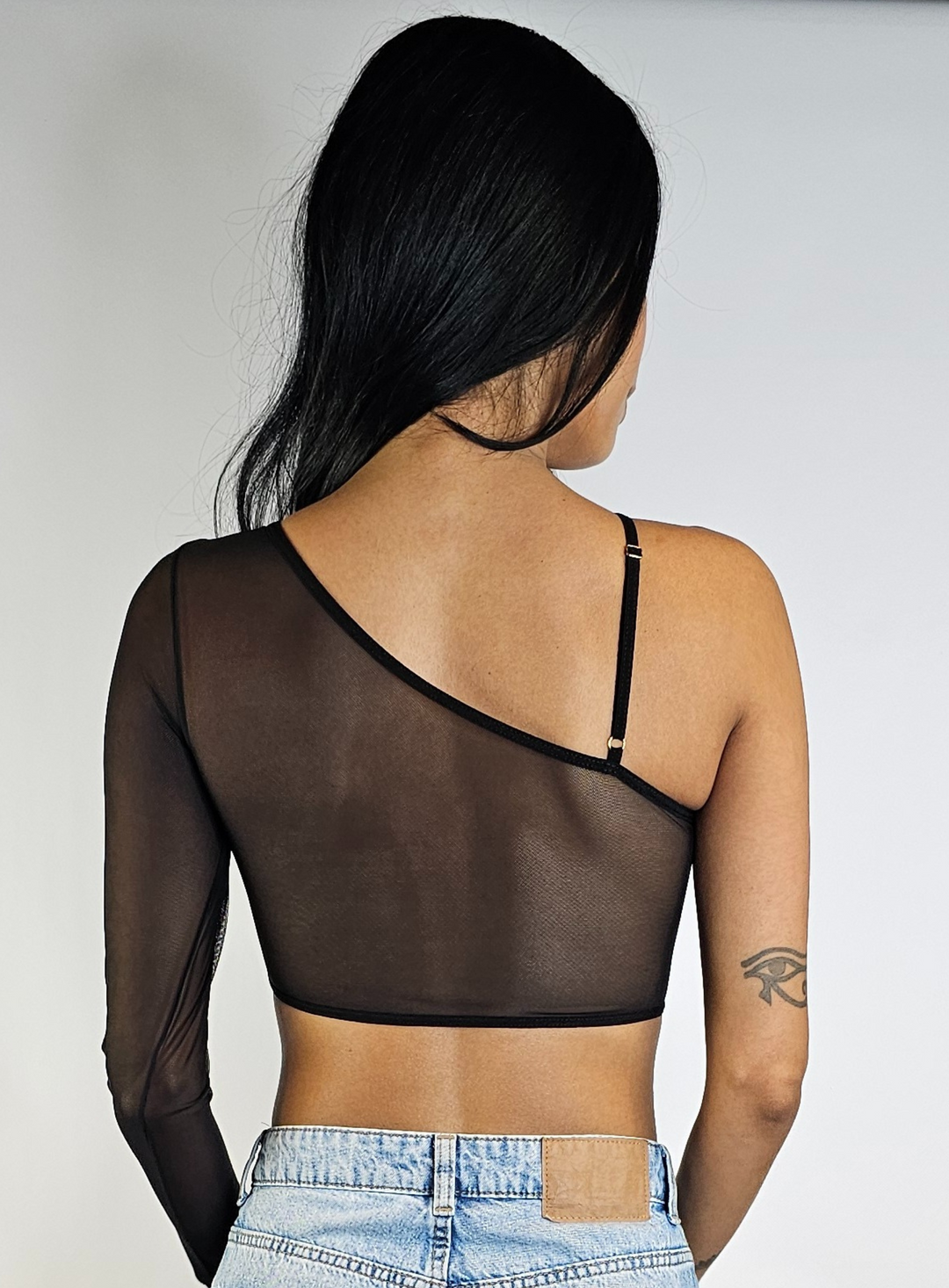 One sleeve blouse with transparences