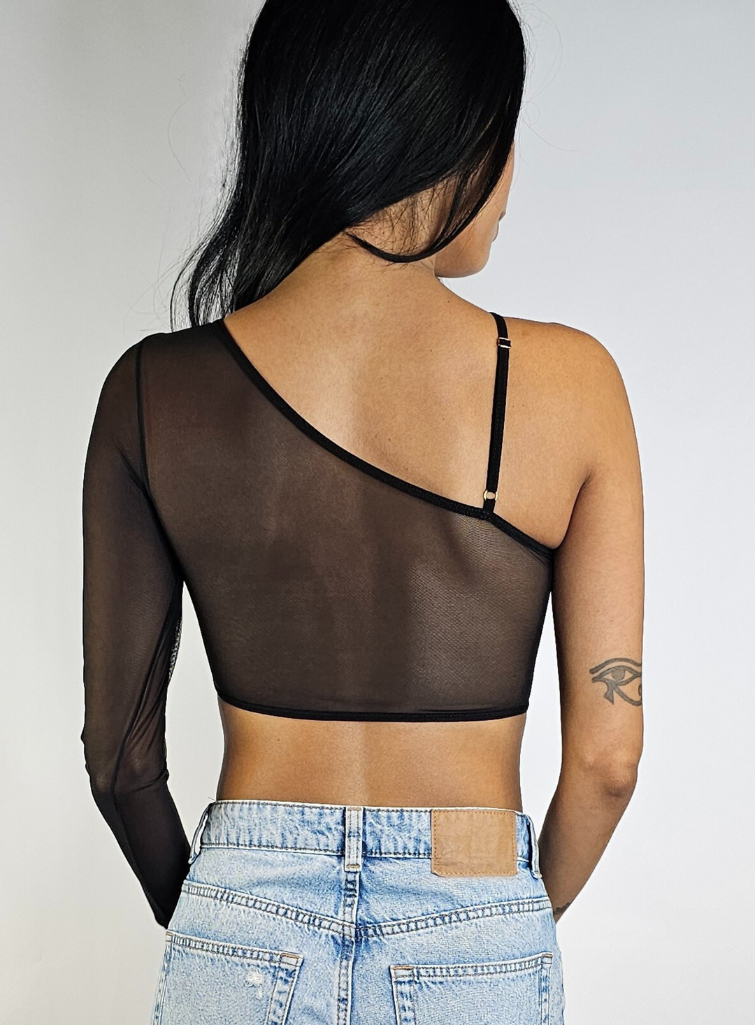 One sleeve blouse with transparences